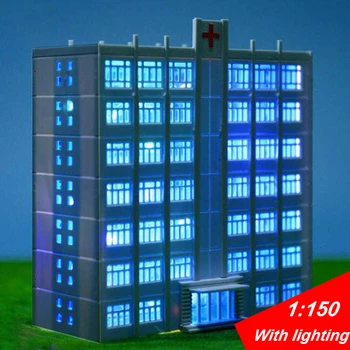 Умален модел на сградата на болницата в мащаб 1:150 с подсветка, събрани архитектурен материал за сладкиш на масата 